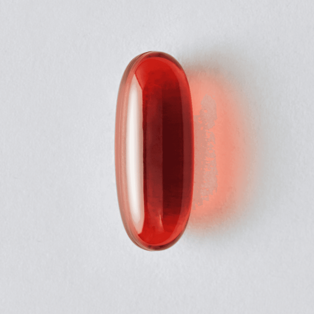 A single Sports Research Keto Omega with Coconut MCT softgel.